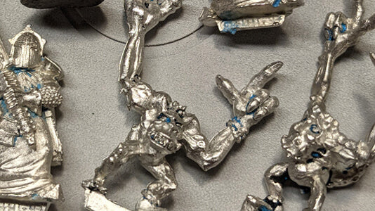 Remove paint from miniatures