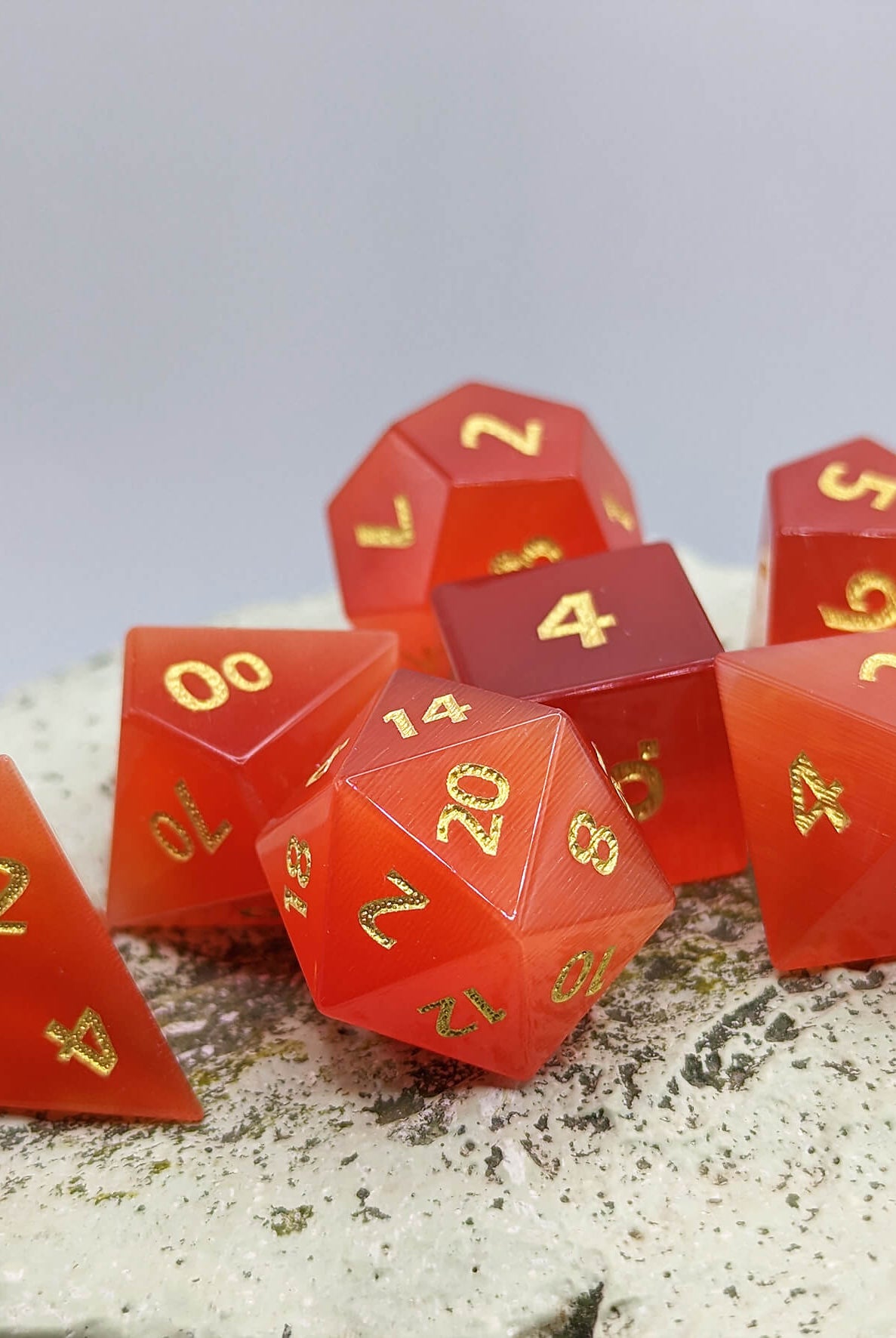 Red cats eye gemstone dice for ttrpg