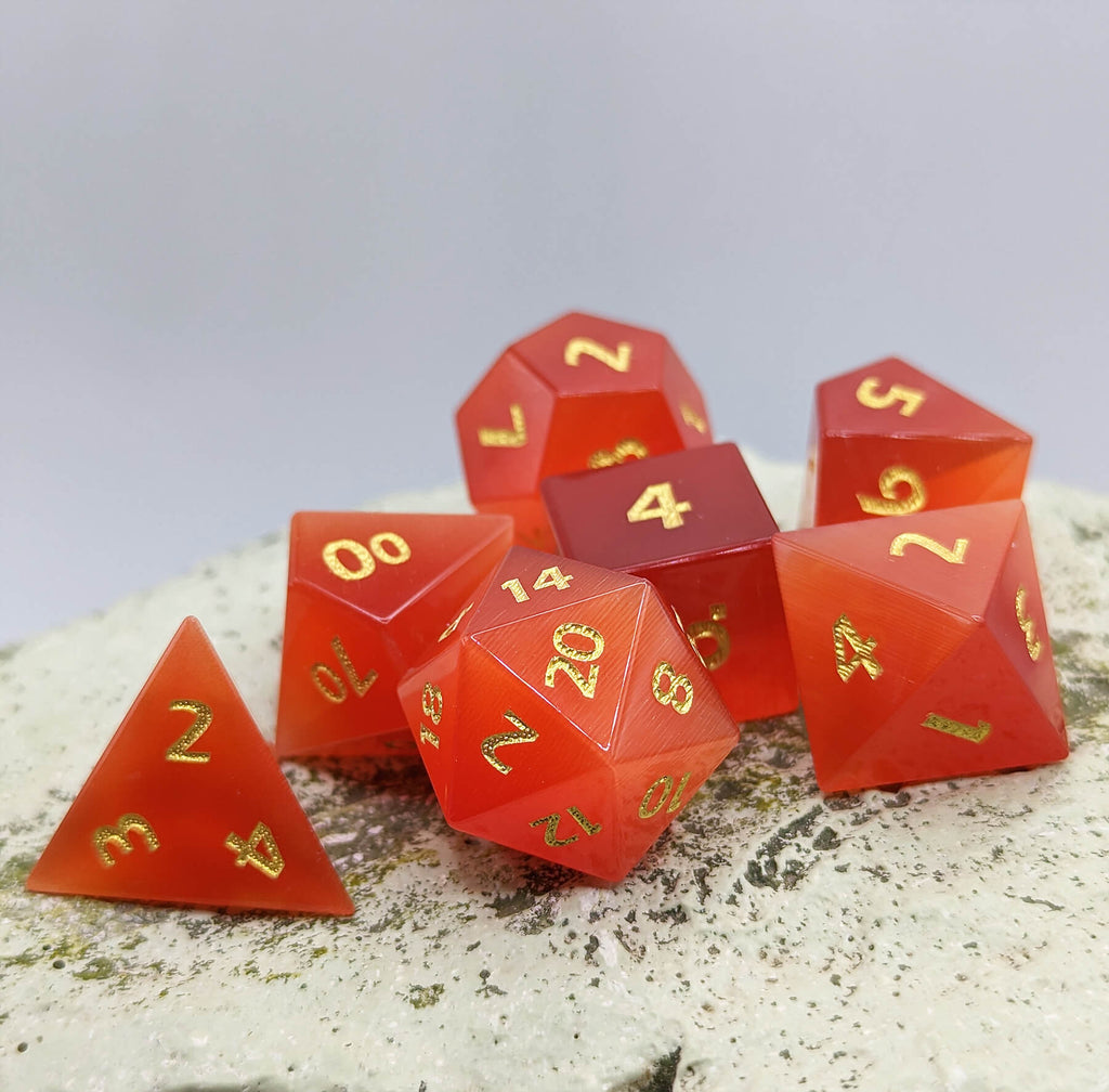 Red cats eye gemstone dice for ttrpg