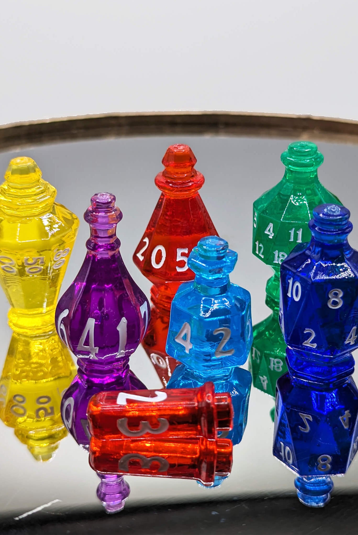 Beautiful ttrpg dice in potion bottle shapes