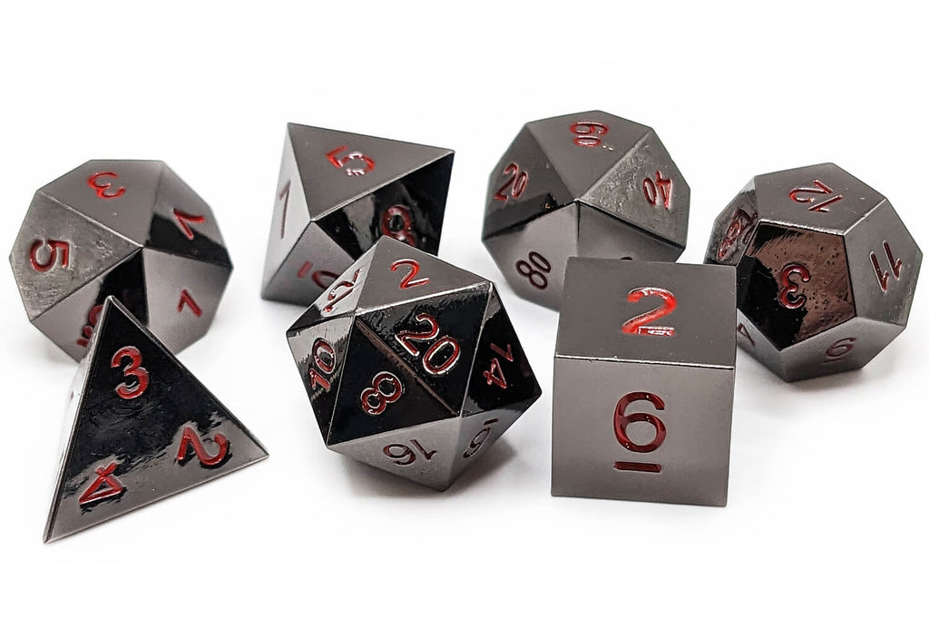 Black metal dice with red numbers for dnd and ttrpg games