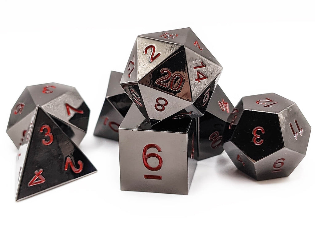 shiny black metal dice with red numbers at Dark Elf Dice