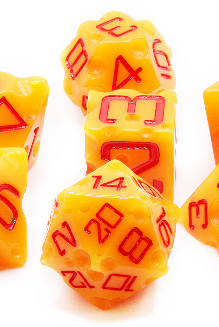 A dnd dice set shaped like cheese