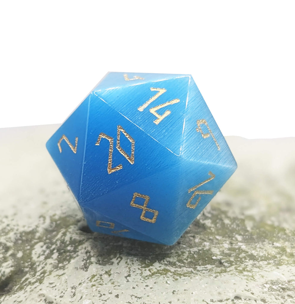 Gemstone dice Blue cats eye d20 with gold numbers