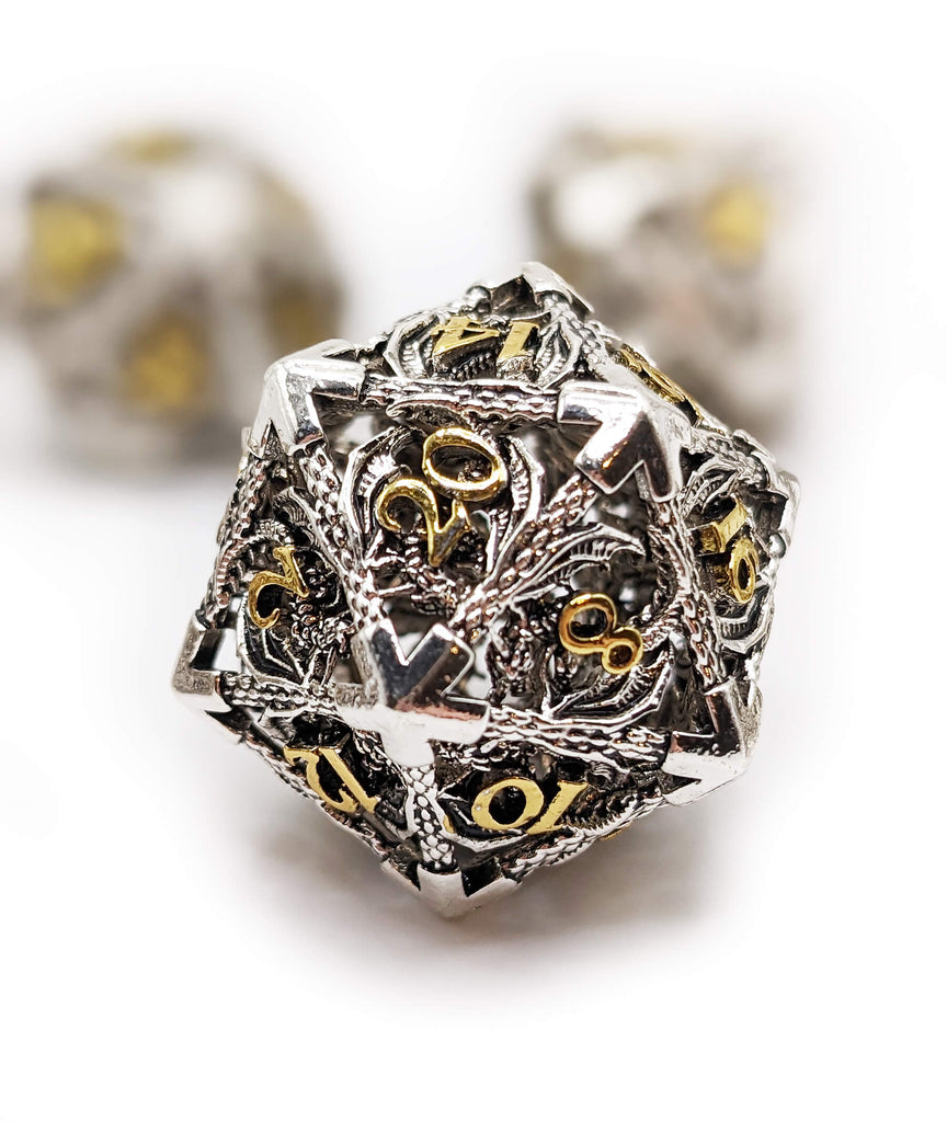 Silver and gold dragon d20 dice