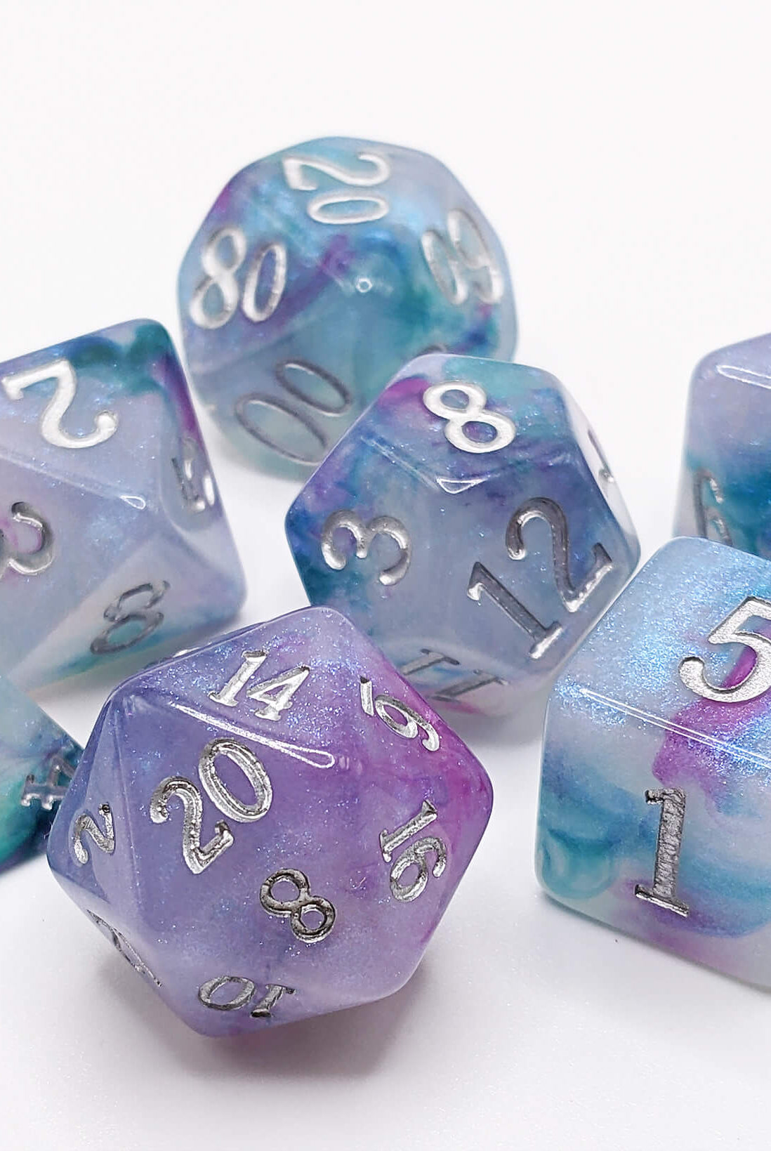 Blue and purple iridescent ttrpg game dice