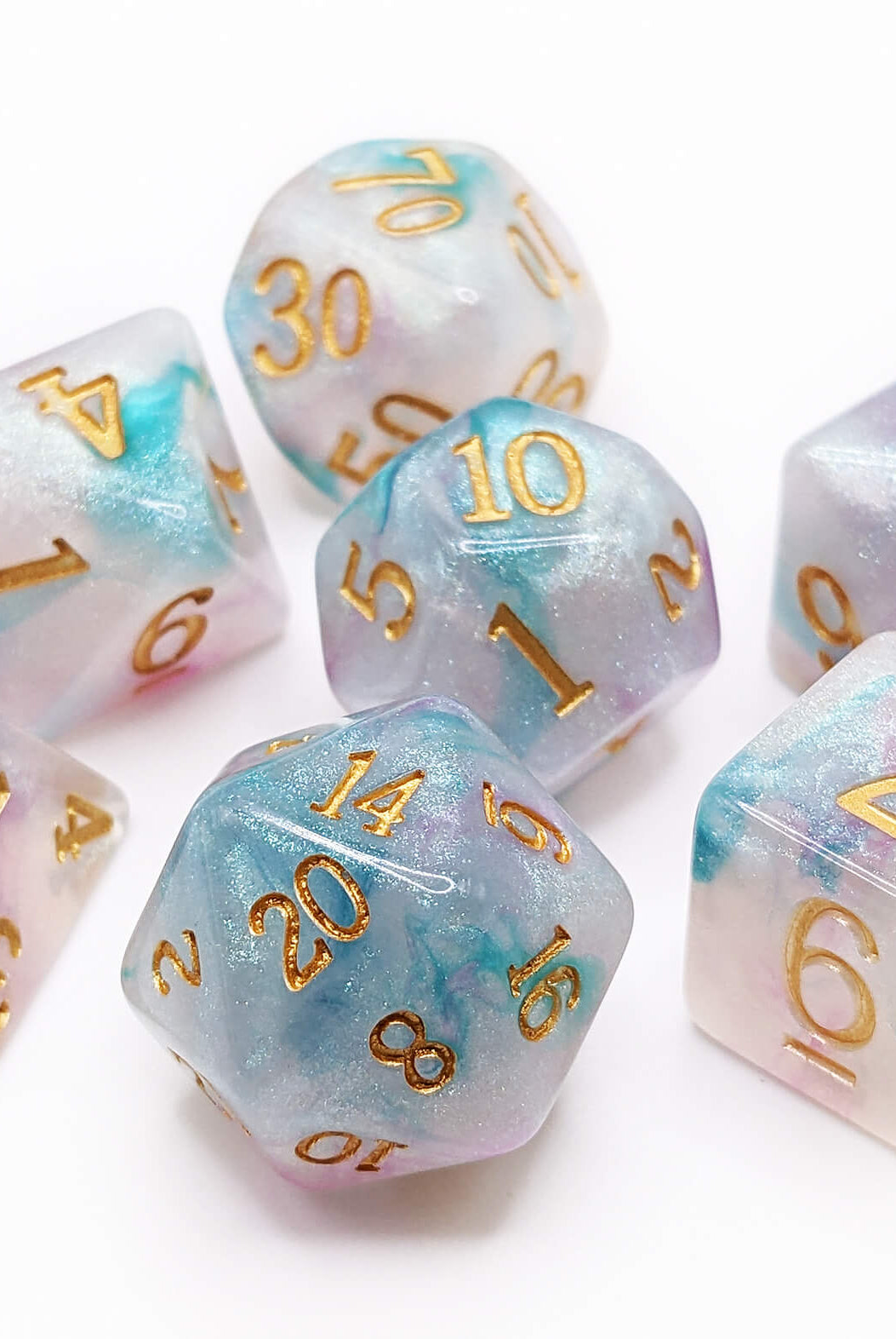Teal and pink game dice for dungeons and dragons games