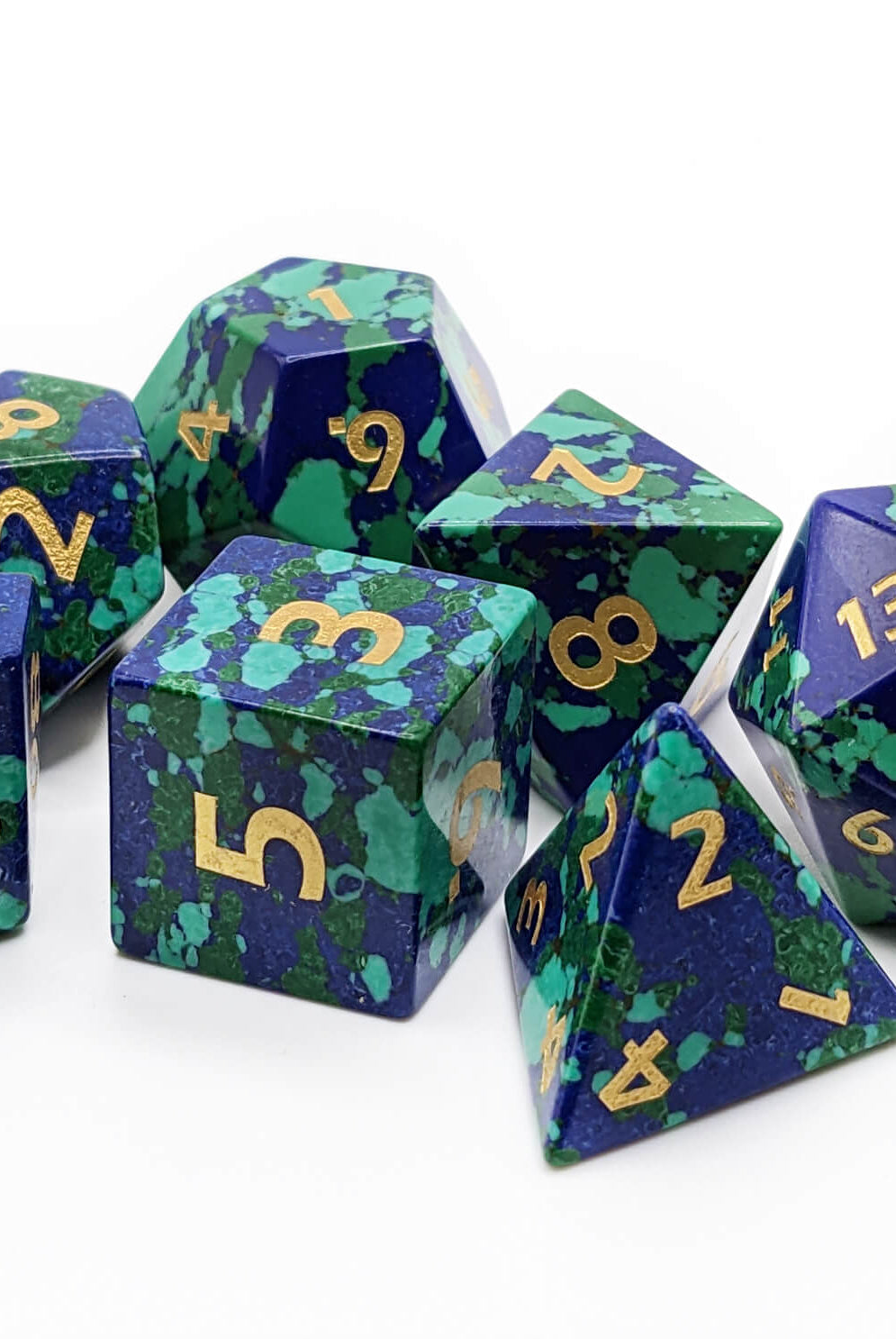 green and blue gemstone dice set