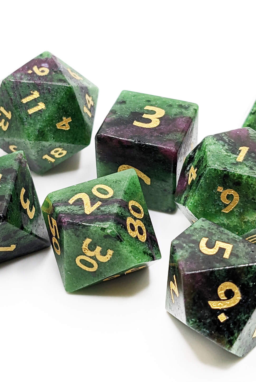 purple and green gemstone zoisite dice
