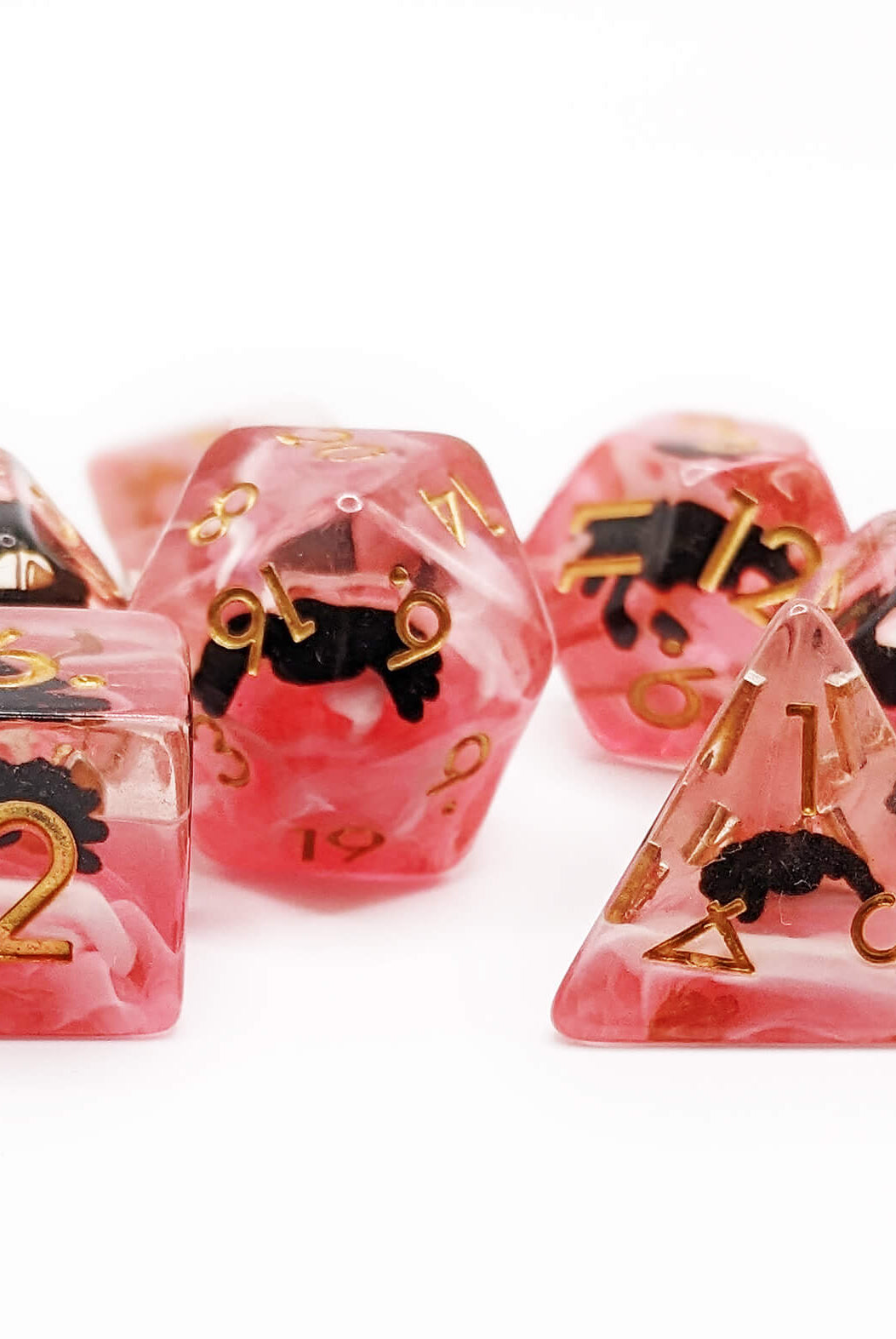 black spider dice with red layer and white webs