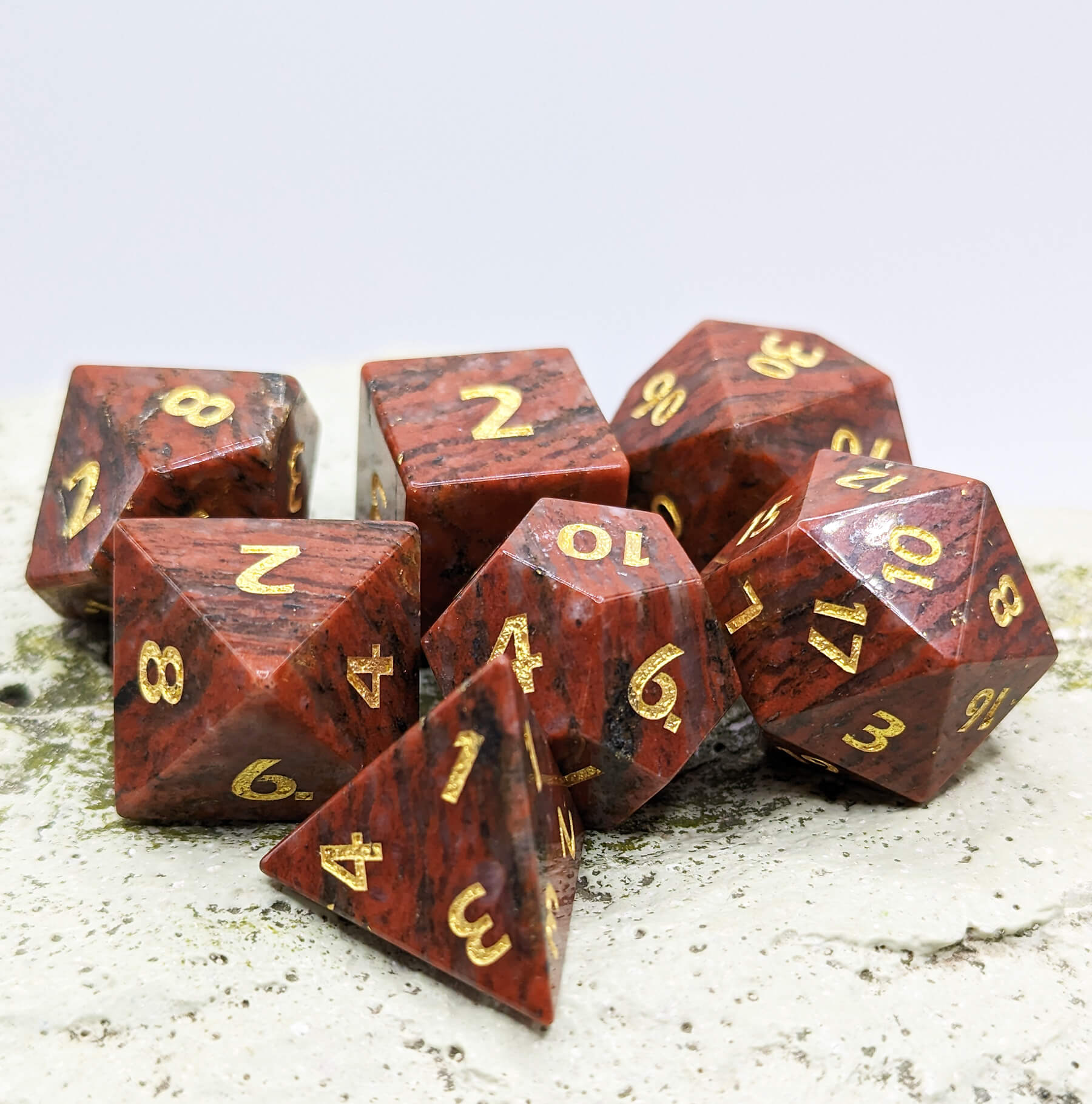 ttrpg dice red granite gemstone