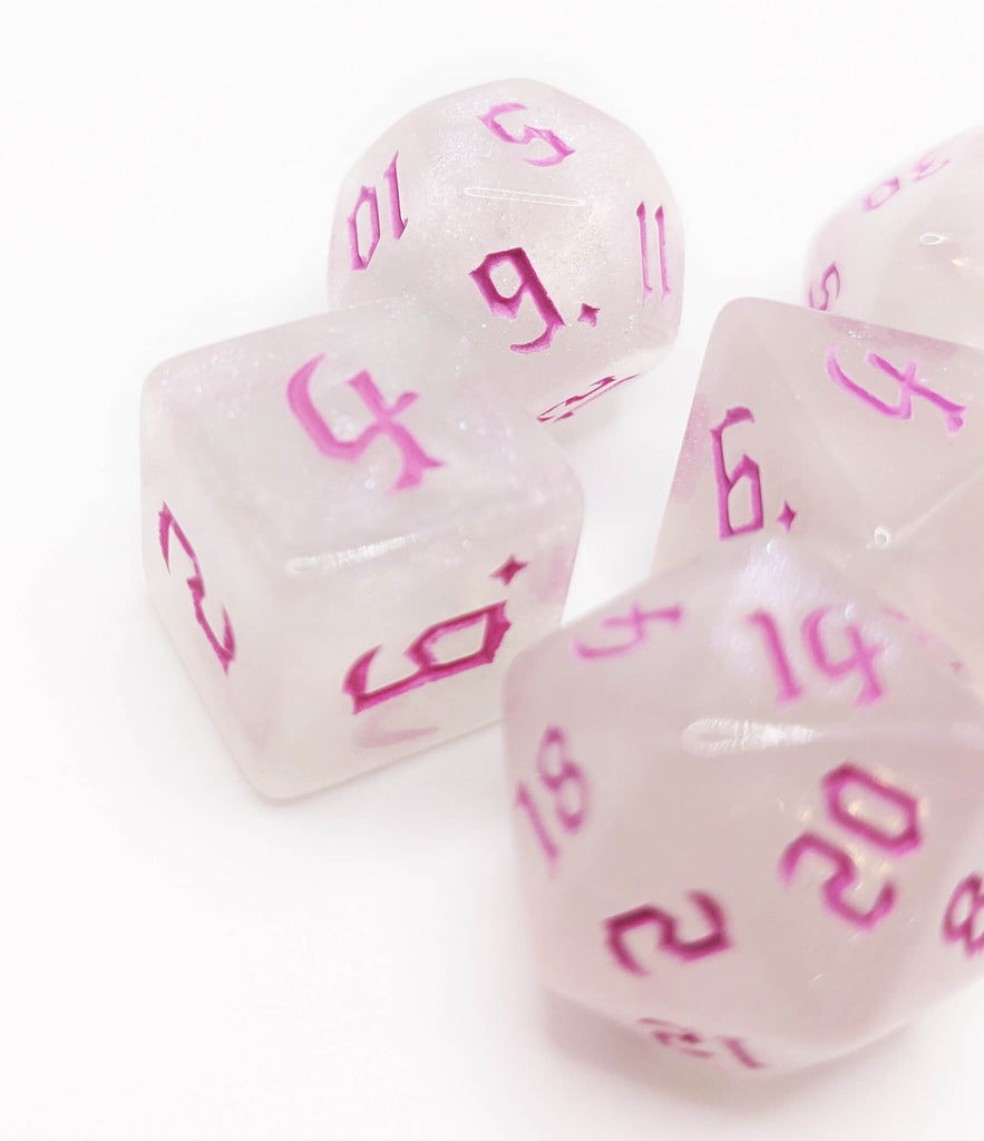 pink and white glitter dice for tabletop games
