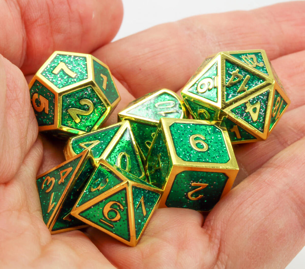 Green and gold enamel dice