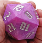 Large pink d20