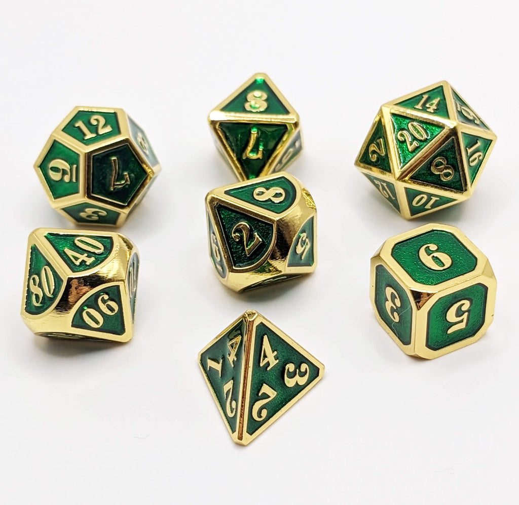 ttrpg gold and green metal dice for games