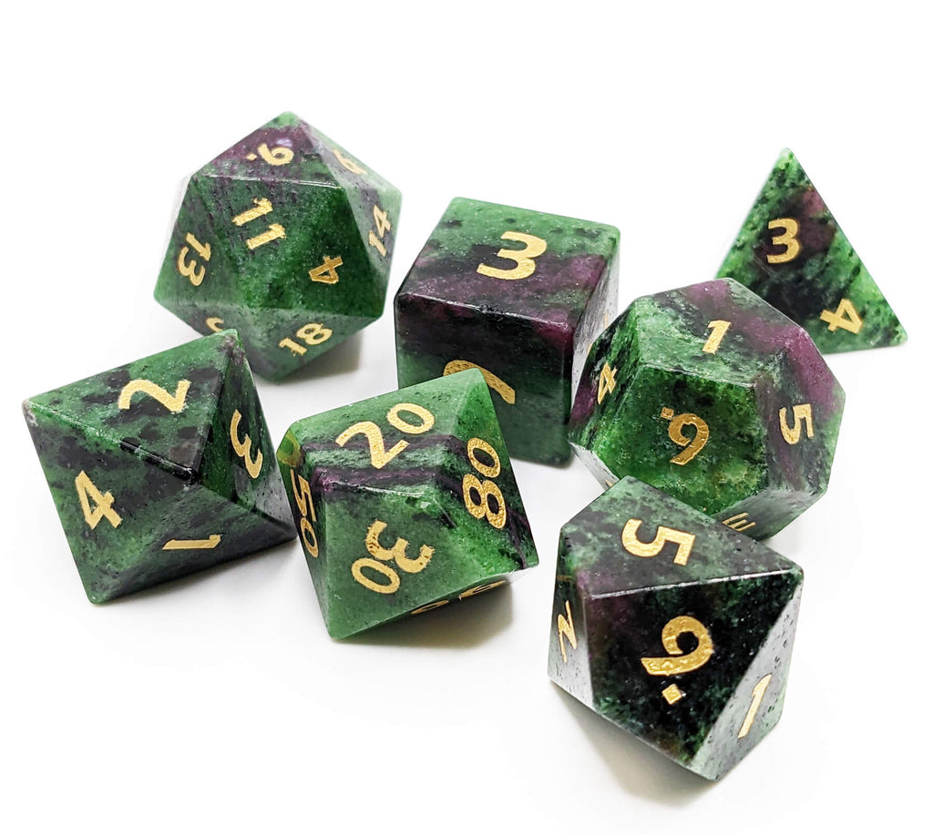 purple and green gemstone zoisite dice