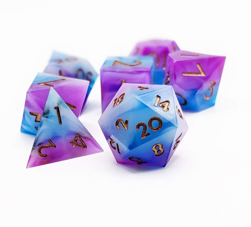 Beautiful TTRPG sharp edge dice in blue and purple